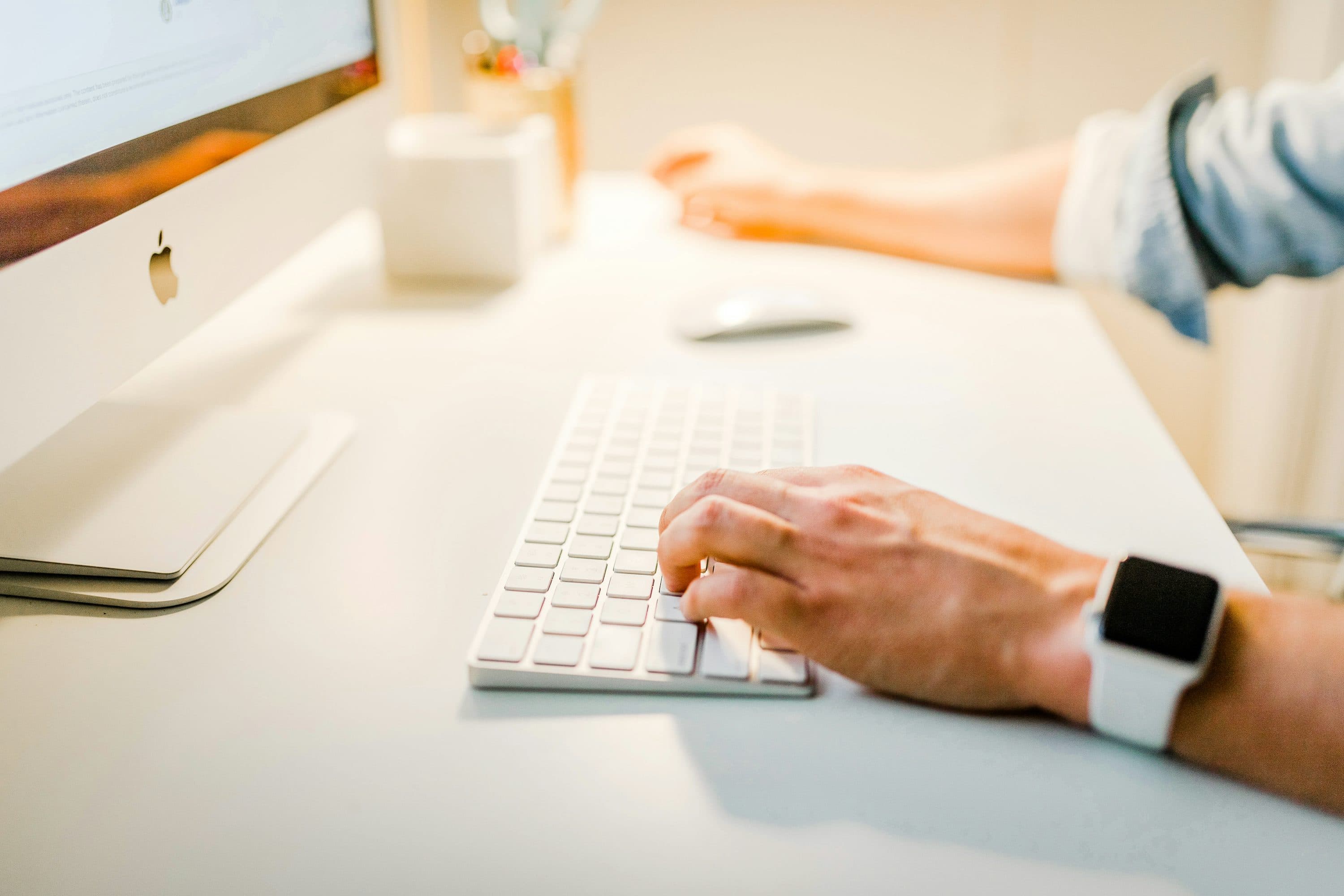 A person building an AI chatbot on a computer